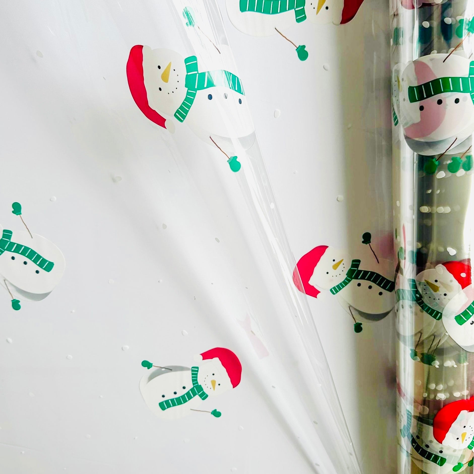 Snowman Christmas Cellophane hamper wrap with emerald green pull bow