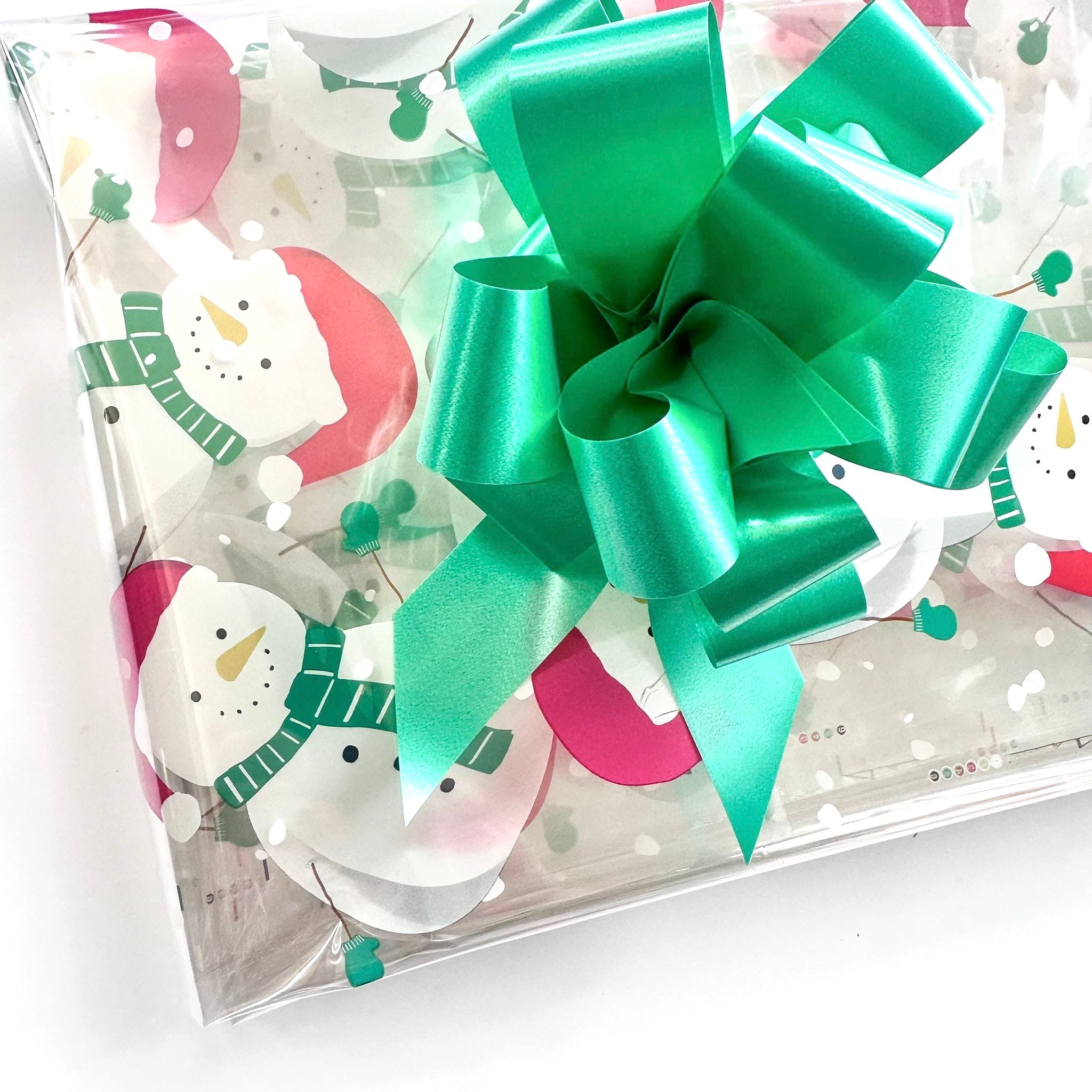 Snowman Christmas Cellophane hamper wrap with emerald green pull bow