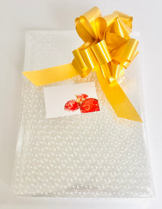 White dot Cellophane hamper wrap / Gold pull bow and Christmas bauble card