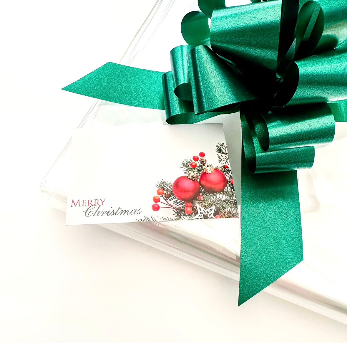 clear Cellophane hamper wrap / Green pull bow and Christmas bauble message card